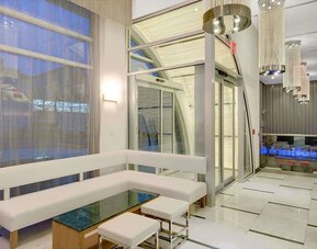 Lounge area at Wyndham Garden Brooklyn Sunset Park.