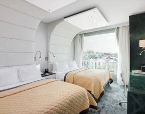 Day use twin room with work desk at Wyndham Garden Brooklyn Sunset Park.