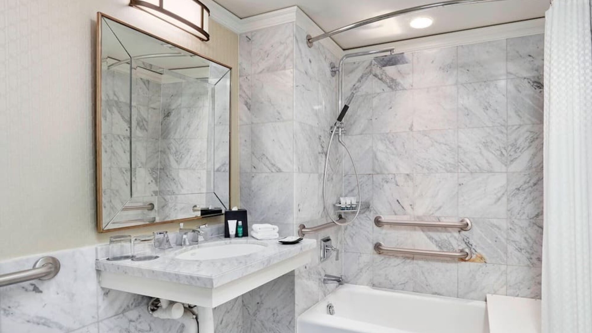 Private guest bathroom with shower and tub at The Westin Philadelphia.
