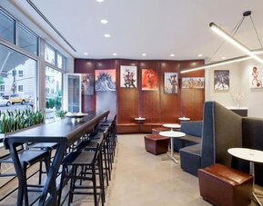 Lobby lounge area and workspace at Nu Hotel - Brooklyn.