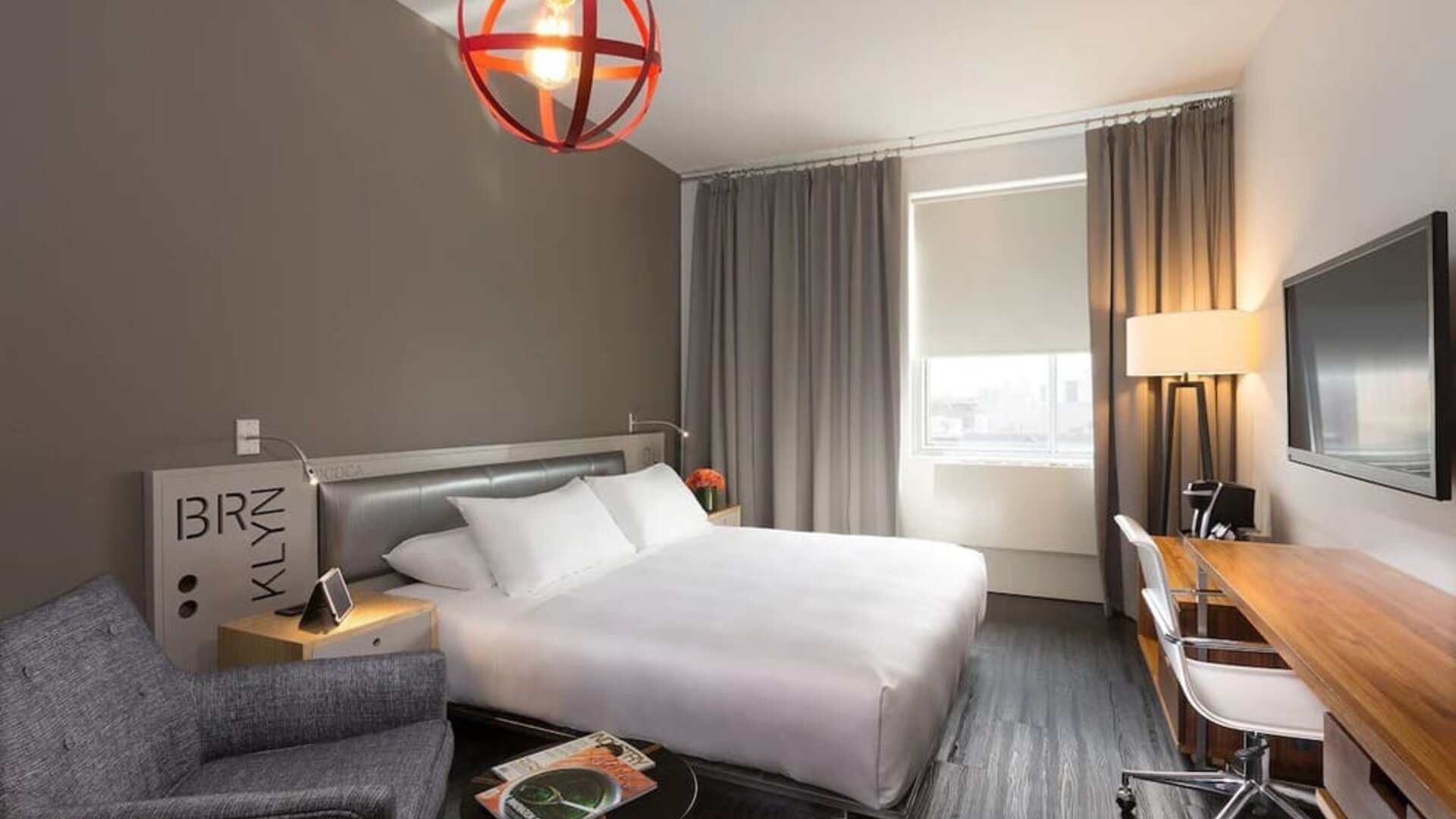Standard room with king bed and work desk at Nu Hotel - Brooklyn.