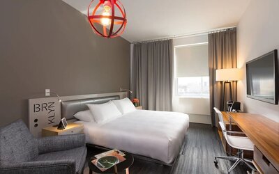 Standard room with king bed and work desk at Nu Hotel - Brooklyn.