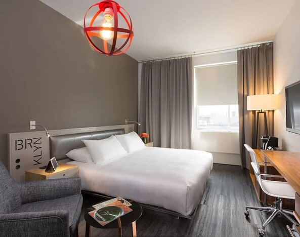 Standard room with king bed and work desk at Nu Hotel - Brooklyn.