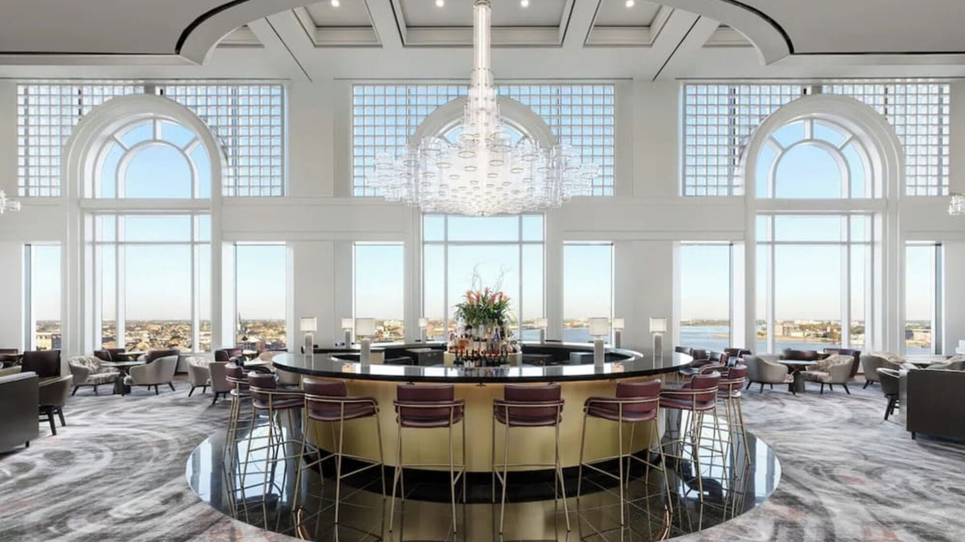 Hotel bar and lounge area with natural light at The Westin New Orleans.