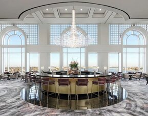 Hotel bar and lounge area with natural light at The Westin New Orleans.