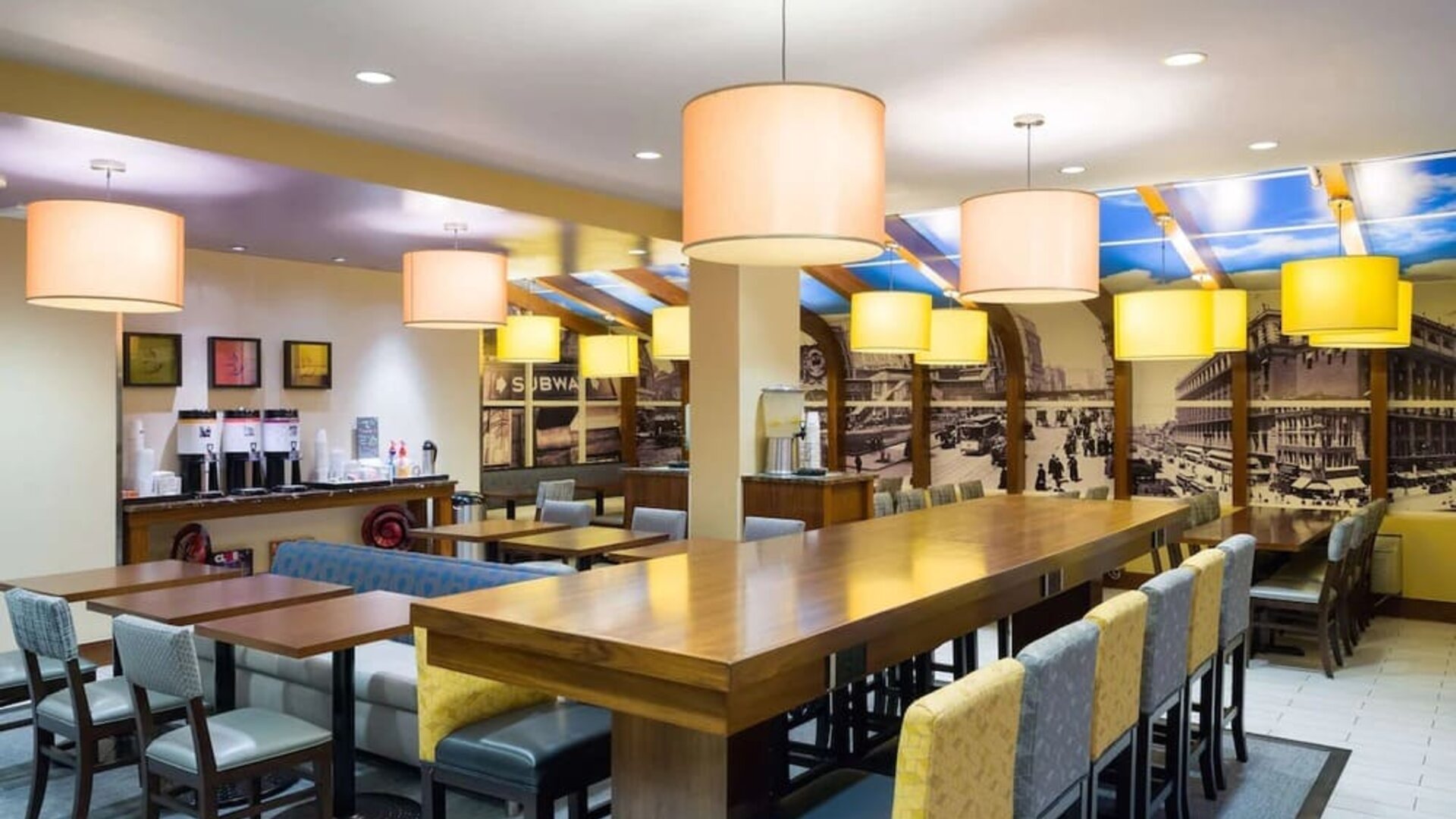 On-site restaurant with comfortable seating, perfect as workspace at Hampton Inn Manhattan - Madison Square Garden.
