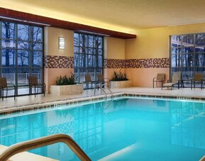 Beautiful indoor pool at Embassy Suites By Hilton Charlotte-Concord-Golf Resort & Spa.