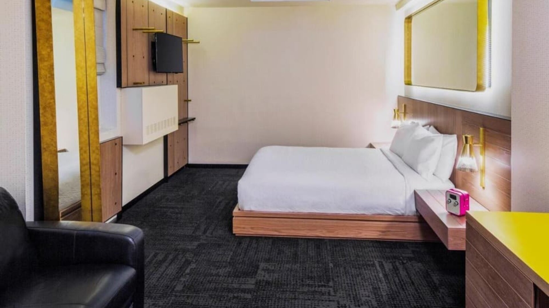 King room with workspace, lounge seating and private bathroom at Hotel Shocard NYC.