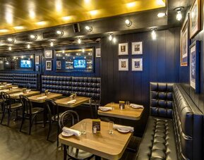 On-site restaurant with comfortable seating, perfect for coworking at Hotel Shocard NYC.