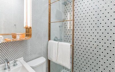 Private guest bathroom with shower at Hotel Shocard NYC.