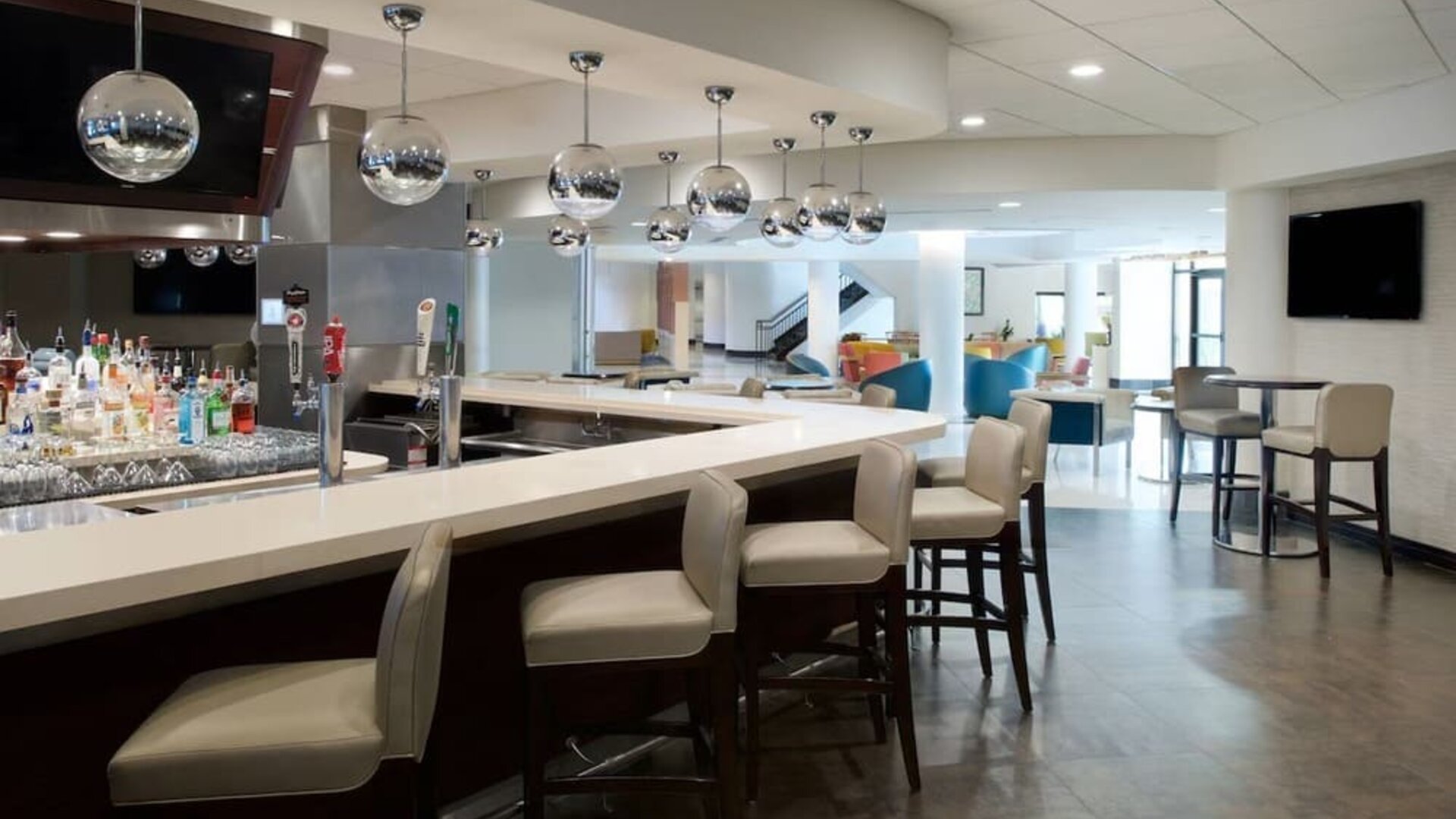 On-site bar with lounge area at Sheraton Miami Airport Hotel.