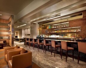 On-site bar with lounge area at EB Hotel Miami.