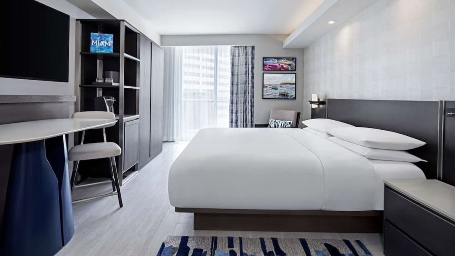 Day use room king bed with work desk and private bathroom at Hyatt Centric Brickell Miami.