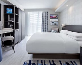 Day use room king bed with work desk and private bathroom at Hyatt Centric Brickell Miami.