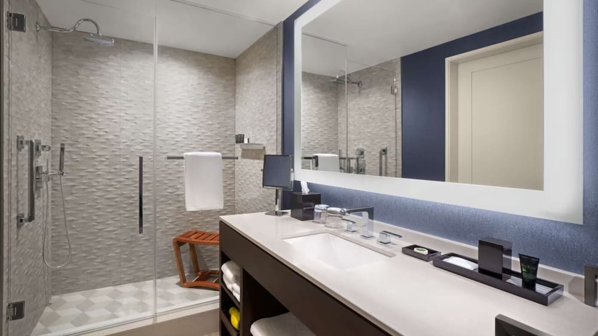 Private guest bathroom with shower and free toiletries at Hyatt Centric Brickell Miami.