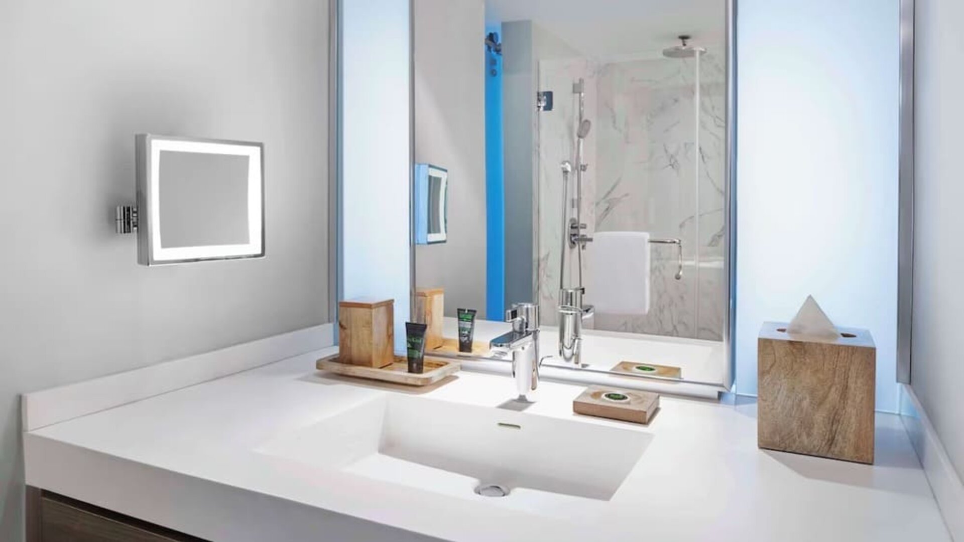 Private guest bathroom with shower and free toiletries at Hyatt Centric Miami South Beach.