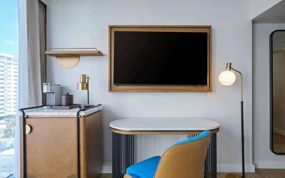 Day use room's workspace with coffee maker and mini-bar at Hyatt Centric Miami South Beach.