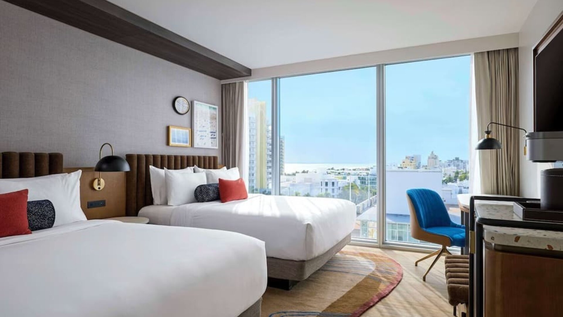 Day use twin room with floor to ceiling windows, work desk and private bathroom at Hyatt Centric Miami South Beach.