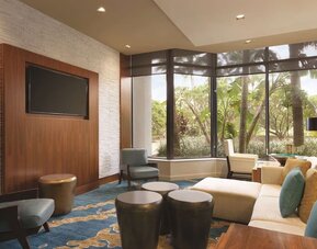 Lounge seating at Hilton Miami Airport Blue Lagoon.