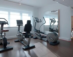 Fitness center at Sheraton Paris Charles De Gaulle Airport Hotel.
