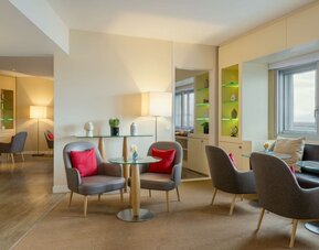 Lobby seating at Sheraton Paris Charles De Gaulle Airport Hotel.