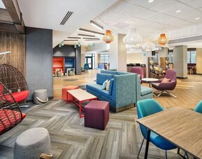 Lounge and coworking space at Tru By Hilton Ft. Lauderdale Airport.