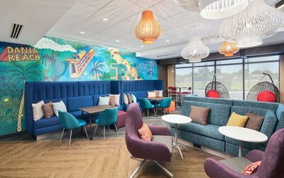 Lounge and coworking space at Tru By Hilton Ft. Lauderdale Airport.