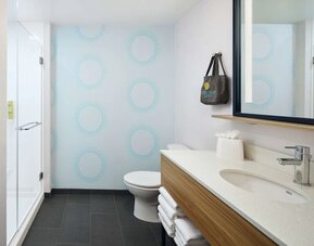 Guest bathroom at Tru By Hilton Atlanta Northlake Parkway.