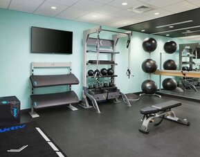 Fitness center at Tru By Hilton Atlanta Northlake Parkway.