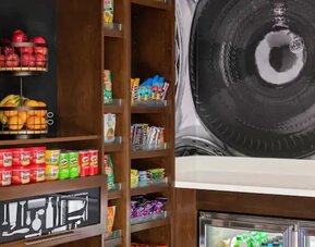Reception desk and snack bar at Hampton By Hilton Cusco.