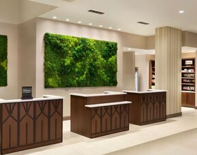 Reception desk at Embassy Suites By Hilton Oahu Kapolei.
