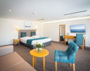 Spacious day use room with sofa at Splendid Hotel & Spa Nice.