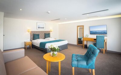 Spacious day use room with sofa at Splendid Hotel & Spa Nice.