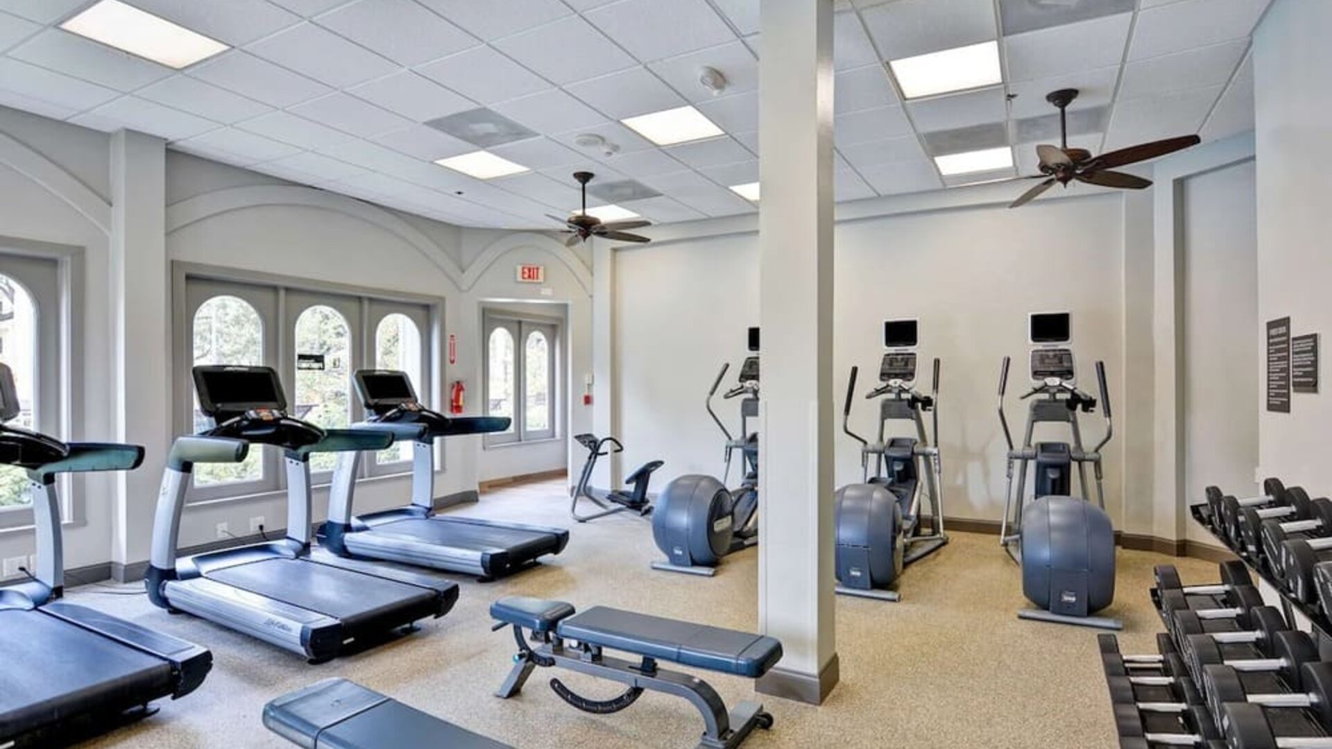 Fully equipped fitness center at Embassy Suites By Hilton Miami - International Airport.