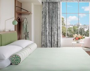 King bed at The Goodtime Hotel.