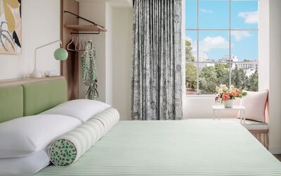 King bed at The Goodtime Hotel.