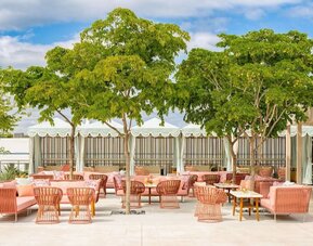 Terrace bar with lounge area at The Goodtime Hotel.