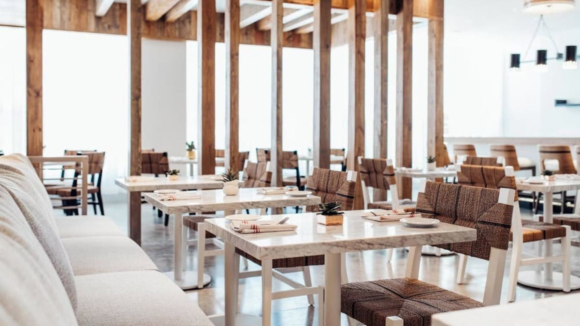 Dining room with comfortable seating, perfect for co-working at Cadillac Hotel & Beach Club, Autograph Collection.