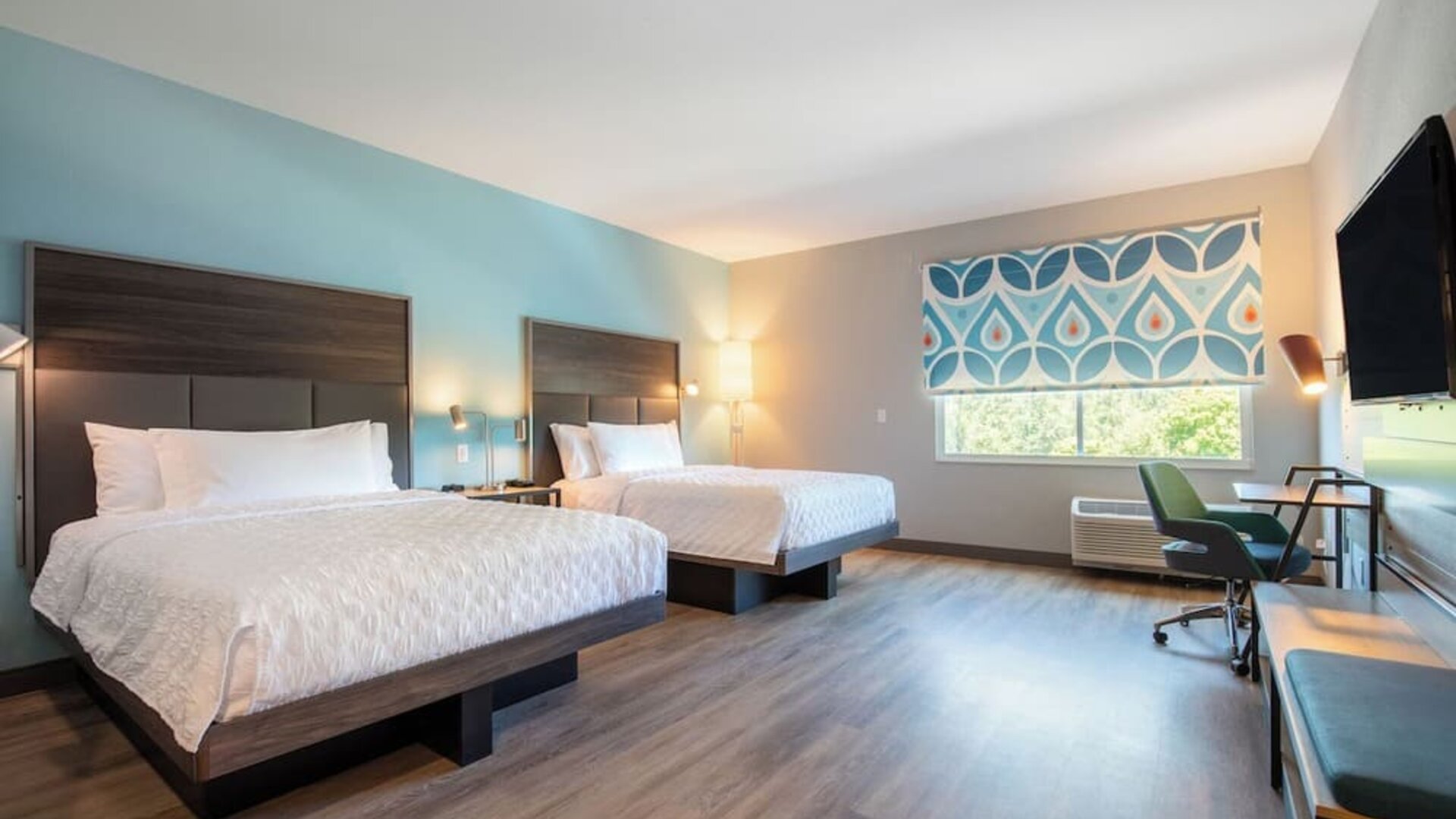 Day use room with TV and work desk at Tru By Hilton Eugene.