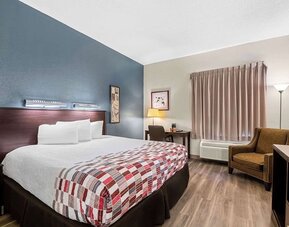 Delux king room with work desk at Suburban Studios Orlando - Ocoee/Winter Garden.