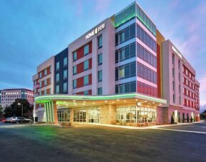 Hotel exterior at Home2 Suites By Hilton San Francisco Airport North.