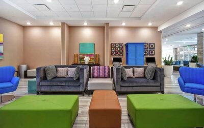 Coworking space and lounge at Home2 Suites By Hilton San Francisco Airport North.