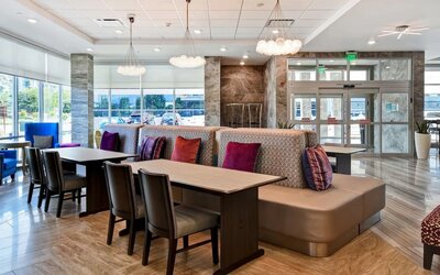 Coworking space and lounge at Home2 Suites By Hilton San Francisco Airport North.
