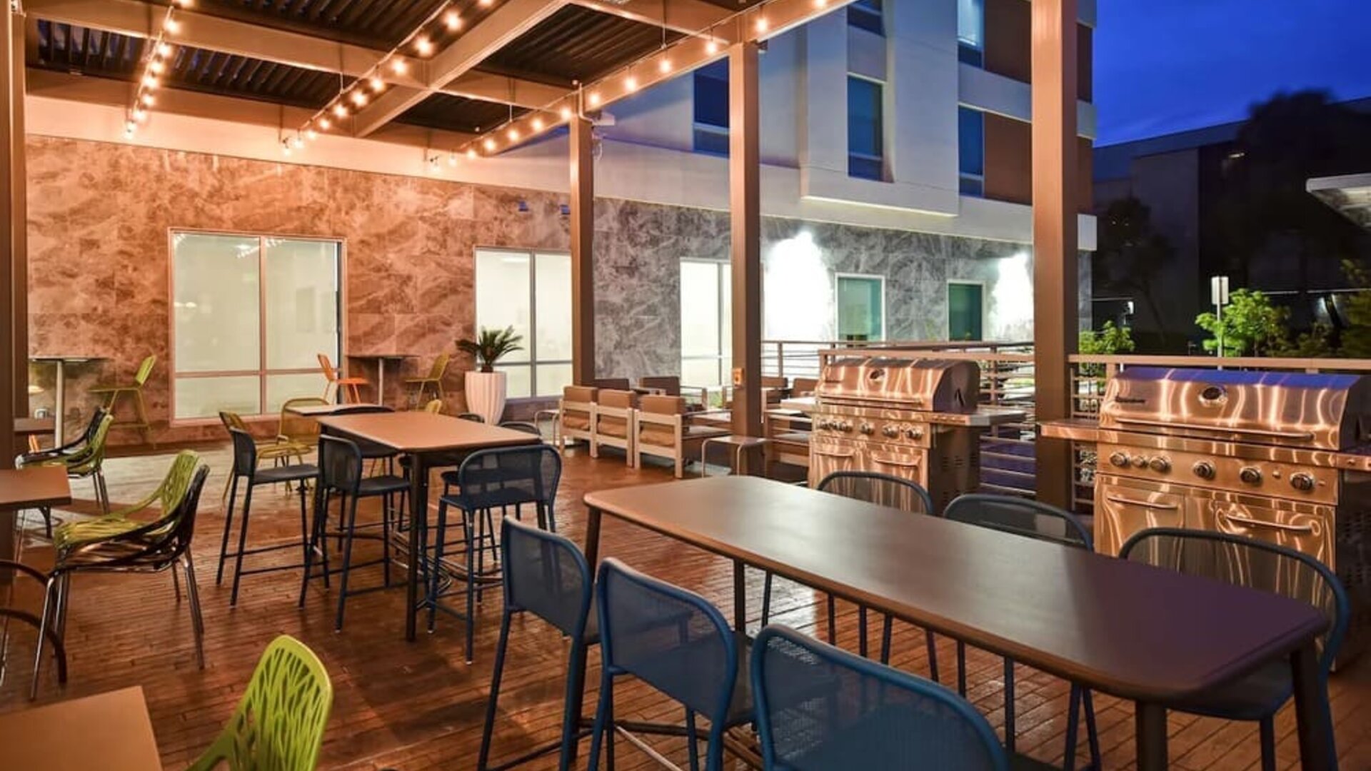 Outdoor seating at Home2 Suites By Hilton San Francisco Airport North.