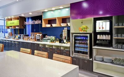 Dining area at Home2 Suites By Hilton San Francisco Airport North.