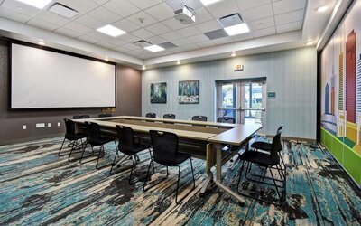 Meeting room at Home2 Suites By Hilton San Francisco Airport North.