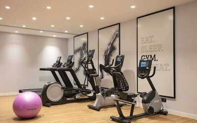 Fitness center at Hilton Garden Inn Paris Orly Airport.