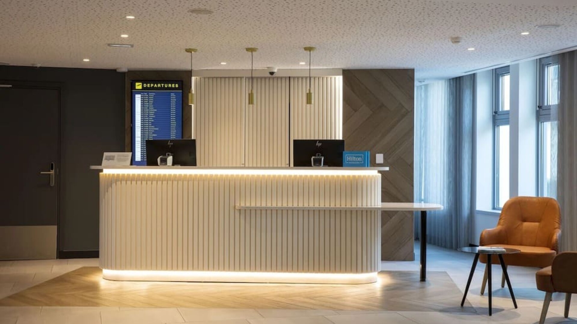 Reception desk at Hilton Garden Inn Paris Orly Airport.