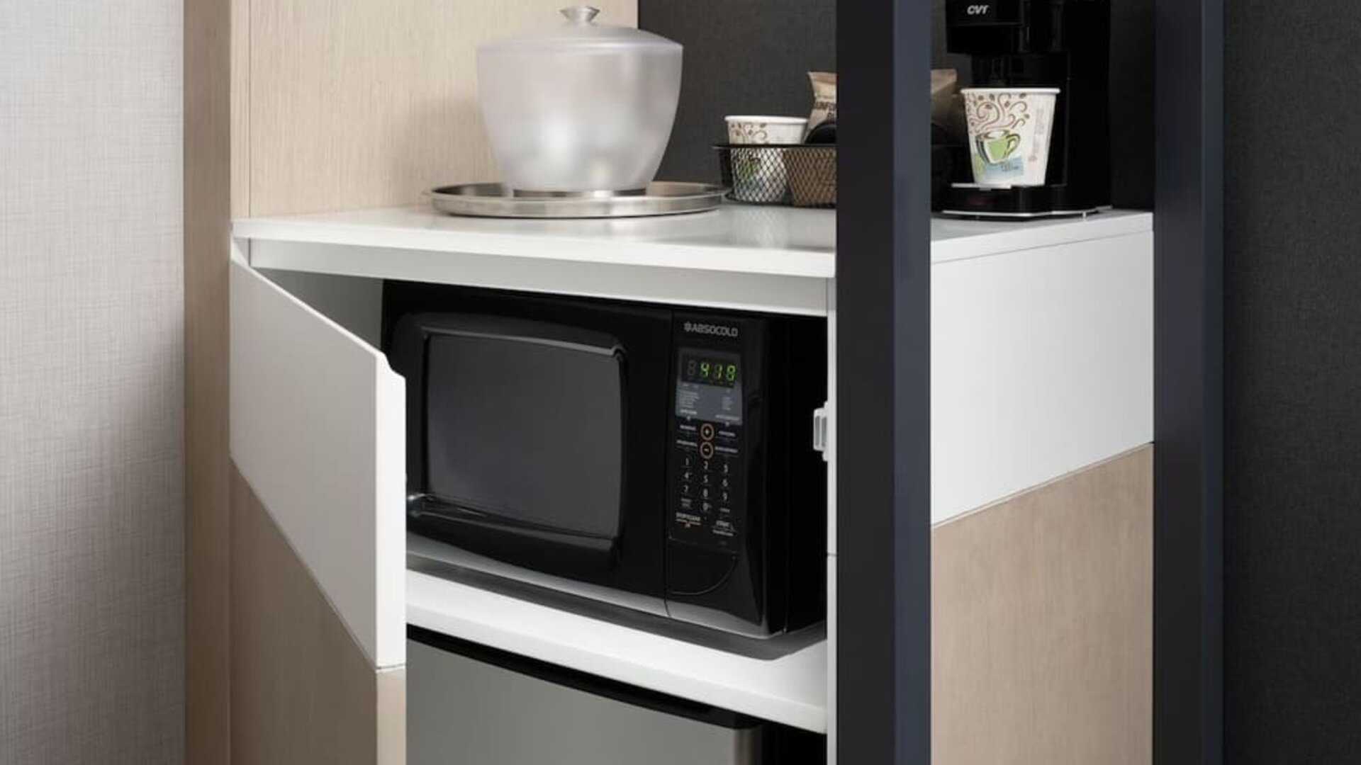 Microwave and bar fridge at SpringHill Suites By Marriott Milpitas.