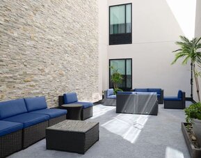 Lobby and lounge at SpringHill Suites By Marriott Milpitas.